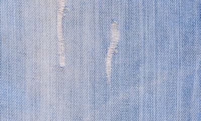 Jeans design.Grunge jeans pattern. Casual jeans background. Grunge denim texture. Surface for text.
