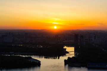 sunrise over the picturesque river in the city