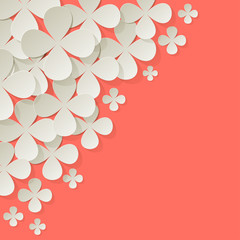 Fototapeta na wymiar Bouquet of lilacs paper white in the corner on a Coral color background