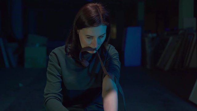 Portrait girl is a drug addict injects drugs into a vein
