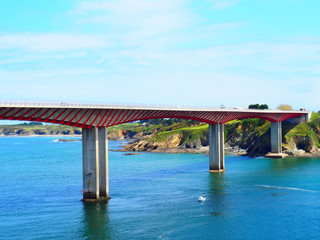 Fototapeta na wymiar View of Puente de los Santos bridge in Ribadeo, over the river Eo, that joins Asturias and Galicia