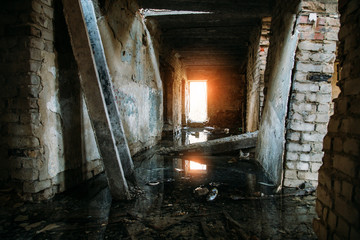 Fototapeta na wymiar Flooded ruined abandoned building