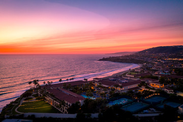 Aerial view over ocean in Dana Point, Orange County in Southern California after sunset during twilight. - obrazy, fototapety, plakaty