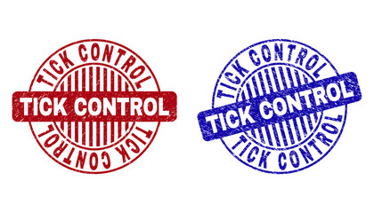 Grunge TICK CONTROL round watermarks isolated on a white background. Round seals with grunge texture in red and blue colors. Vector rubber overlay of TICK CONTROL tag inside circle form with stripes.