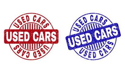 Grunge USED CARS round stamp seals isolated on a white background. Round seals with grunge texture in red and blue colors. Vector rubber overlay of USED CARS text inside circle form with stripes.