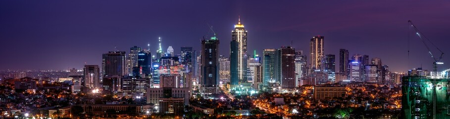 Fototapeta na wymiar Wide panorama of Bonifacio Global city skyline at Magic hour 