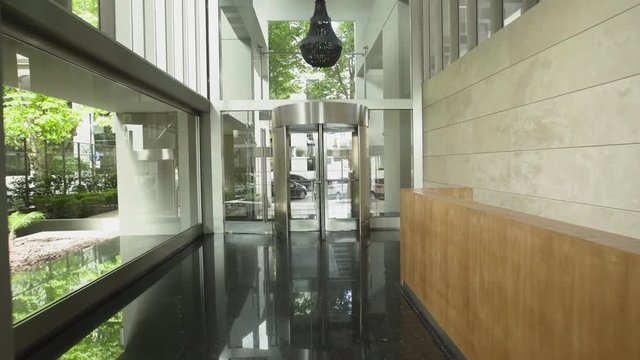 Point of view shot of empty corridor of modern hotel