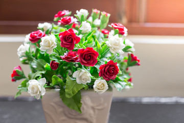 Bouquet of roses in small vases