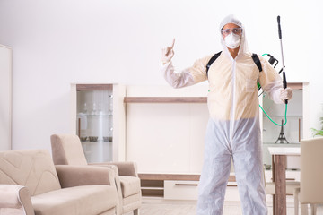 Pest control contractor working in the flat 