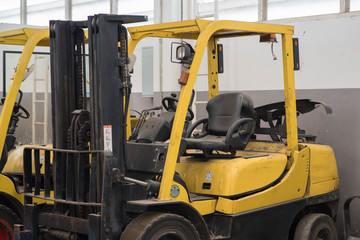 Forklifts in warehouse