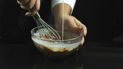 Chocolate to decorate the festive cake mixed with cream.