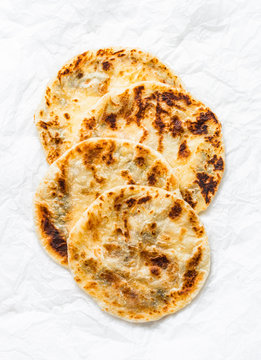 Indian Paratha Flatbread On A Light Background, Top View