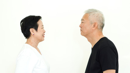 Asian senior couple happy together expression white background