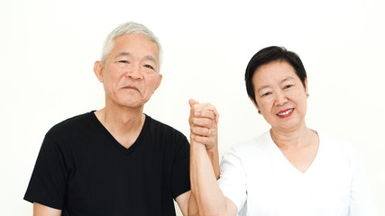 Asian senior couple hold hand happy marriage together expression white background