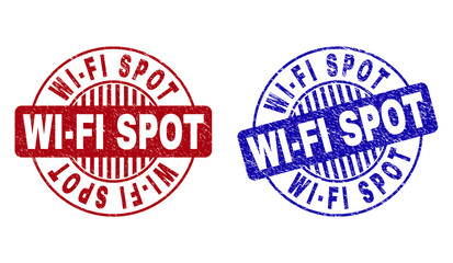 Grunge WI-FI SPOT round stamp seals isolated on a white background. Round seals with distress texture in red and blue colors.