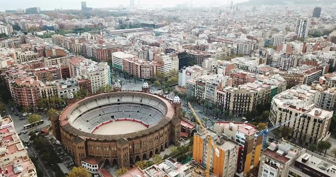 Aerial view of Eixample district and La Monumental, bullfighting arena of Barcelona, Catalonia, Spain