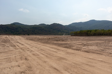 empty dirt field on sunny day at Thailand