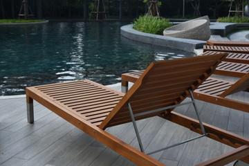 wooden poolbed at the resort swiming pool
