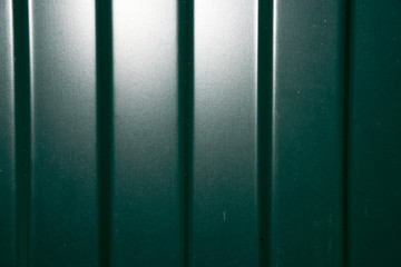 The green corrugated sheet metal