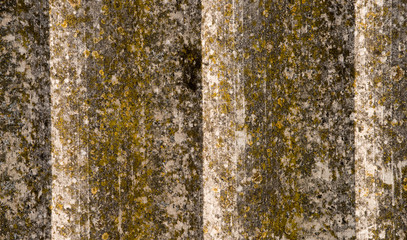 The texture of an old asbestos house roof in a village or an old
