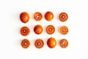 Red orange on white background. Flat lay, top view