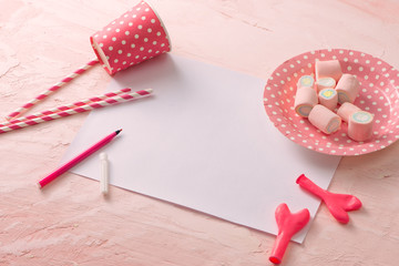 Party management and organization concept with sweets, confetti and blank pages. Creative celebration flat lay with copy space.