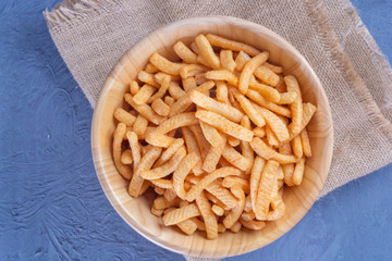 Shrimp cracker or prawn cracker on wooden bowl