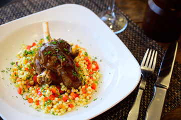 Fried meat with corn sauce on a plate