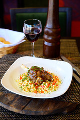 Fried meat with corn sauce on a plate