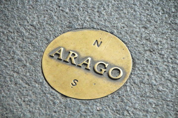 One of the 135 Arago medallions located throughout Paris and denoting the zero meridian, this...