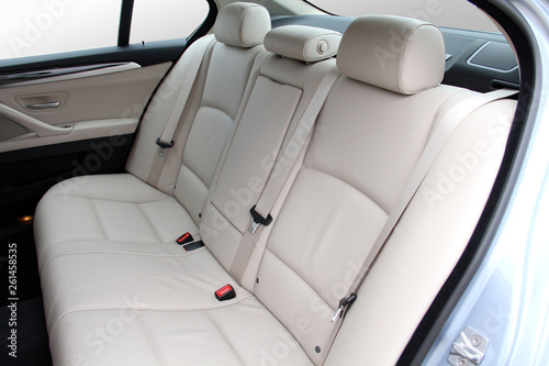 white rear seat of a luxury passenger car
