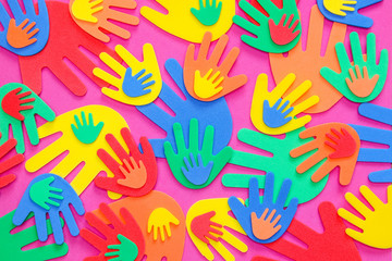 Brightly colored foam hand shapes of red, orange, yellow, green and blue