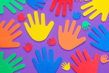 Brightly colored foam hand shapes of red, orange, yellow, green and blue