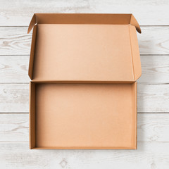 Open cardboard box top view isolated with no shadows clipping path included
