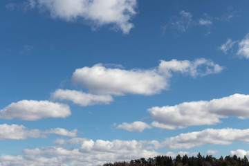 Blue sky with white clouds.