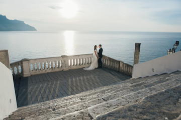 Young wedding couple having fun Time  in Italy.