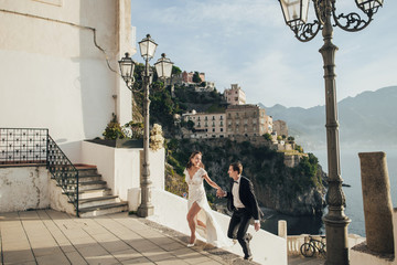 Young wedding couple having fun Time  in Italy.