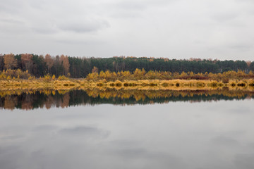 Panoramic view of autumn forest and river.