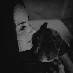 portrait of a woman with a teddy bear