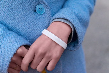 Hands with white bracelet