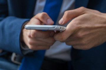 business man closeup with mobile phone