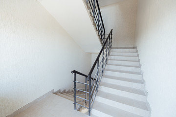 Iron stairs between the floors in the house