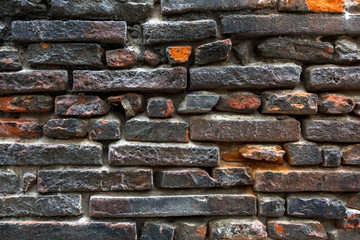 Black and orange brick texture.