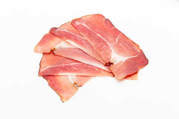 Hamon sliced on white background. Spanisch traditional meat.