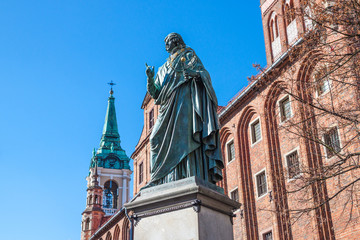 Naklejka na ściany i meble Famous statue of astronomer a (Mikolaj Kopernik) in Torun. Poland