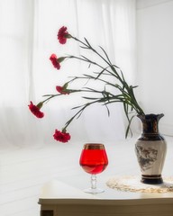 Still life with a bouquet of carnations