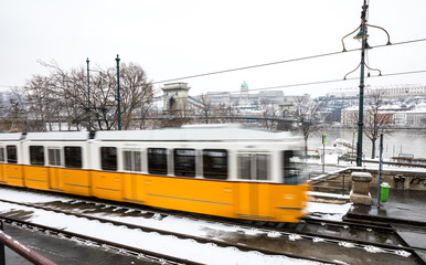 Fototapeta premium A view of Yellow tram in Budapest at winter