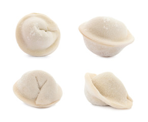 Set of delicious raw dumplings on white background