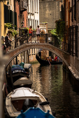 Fototapeta na wymiar A view of Venice cityscene with gondola romantic narrow canal