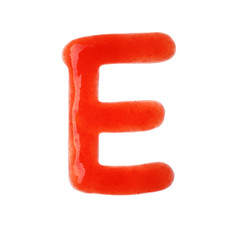 Letter E written with red sauce on white background